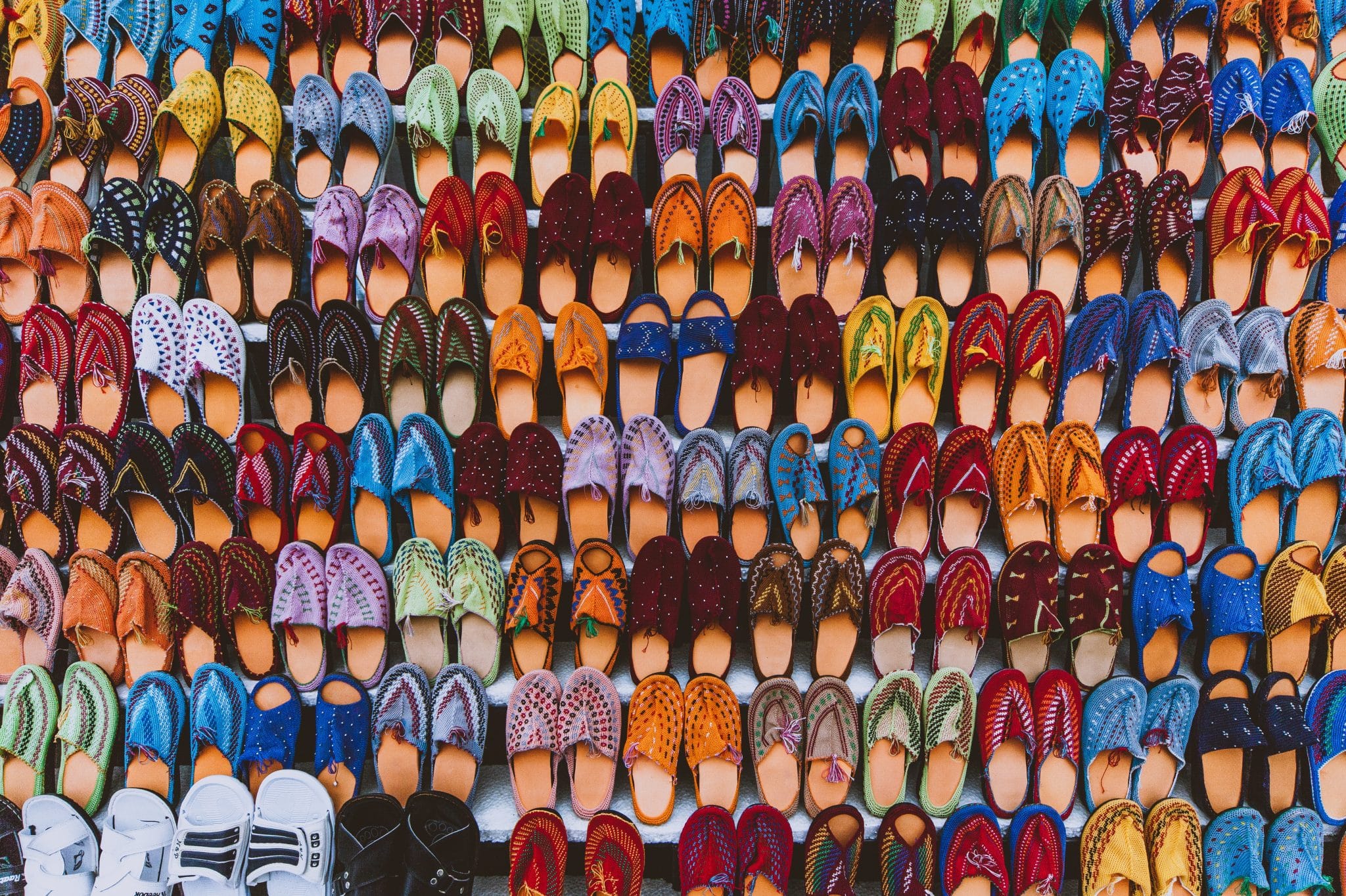 Colorful shoes lined up in a nice pattern