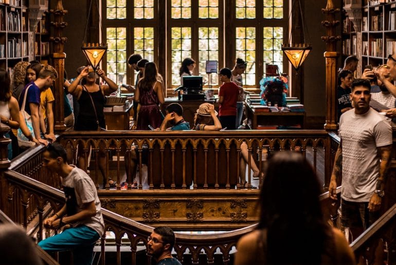 College students enjoying time in a library for free.