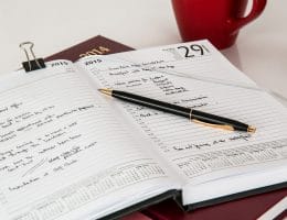 Dates written in a planner.