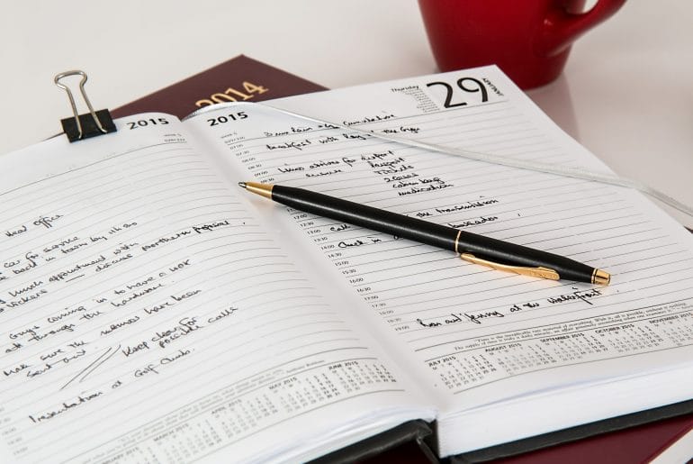 Dates written in a planner.