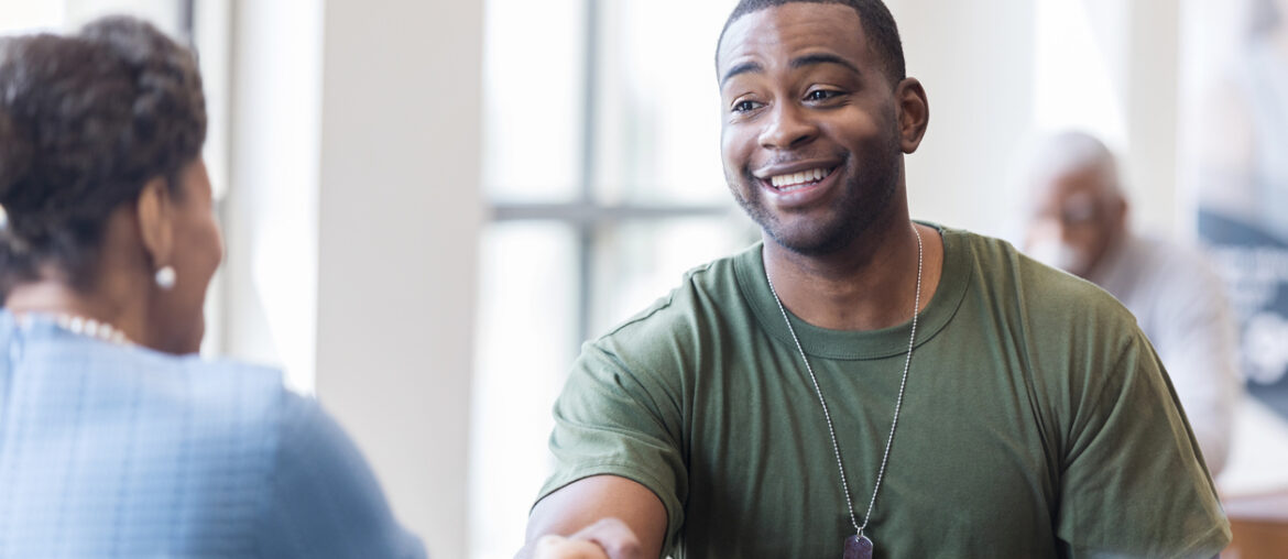 military veteran speaks with vet success counselor about college life
