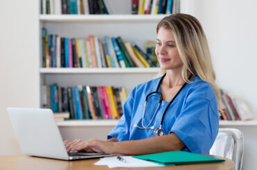 nurse studying online degree program