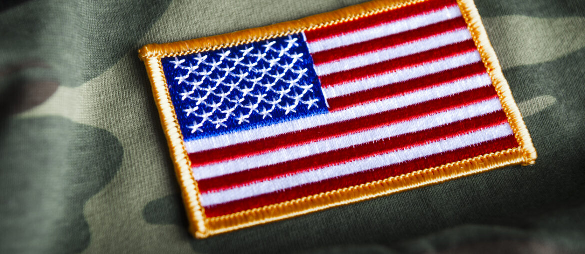 military officer in training and American flag patch