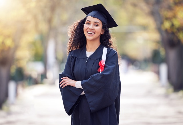 A student graduating who took CLEP and DSST exams to get her degree