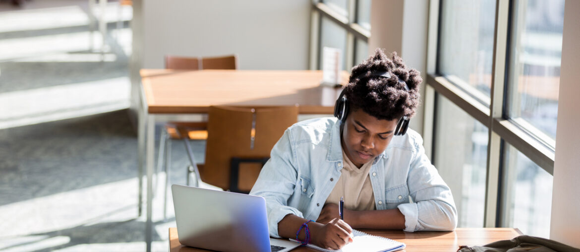 Student wondering what does CLT stand for while studying at a desk