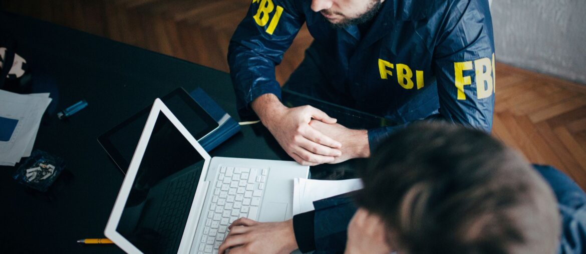 Students learning "How Do You Get Into the FBI?" by reading a blog on their laptop