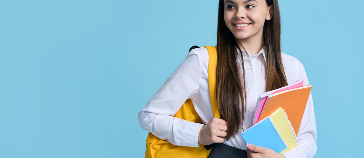 Female Student Studying HSPT Test Prep on their laptop at home