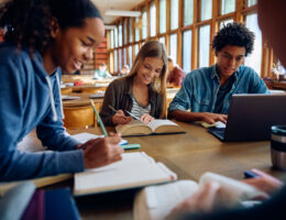 Students using study techniques for exams in a group setting by actively learning