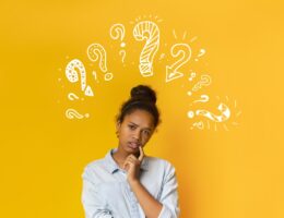 Standardized Tests: 5 Common FAQs Every Student and Parent Should Know Student with many standardized tests and questions on their mind.