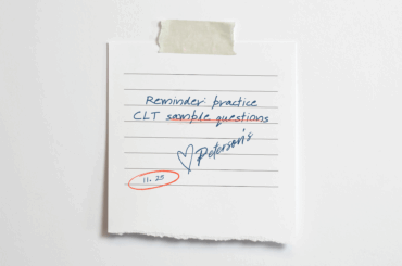 Handwritten note that states: "Reminder: practice CLT sample questions," with a heart and signed by Peterson.