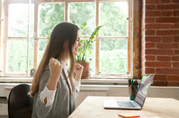 Student excited to earn credit by researching CLEP exam pass rates