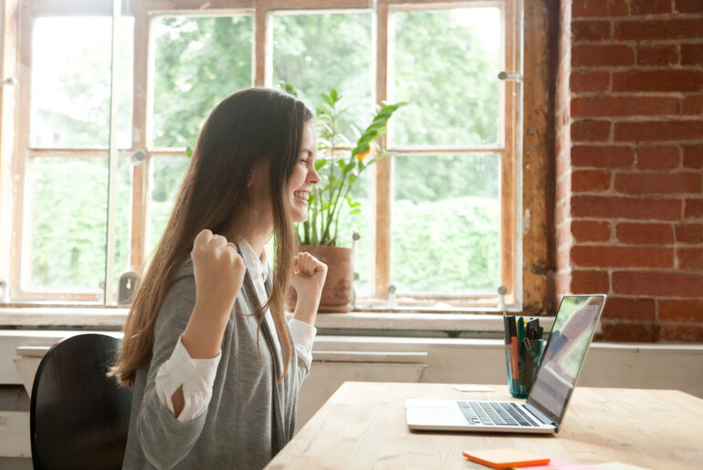 Student excited to earn credit by researching CLEP exam pass rates