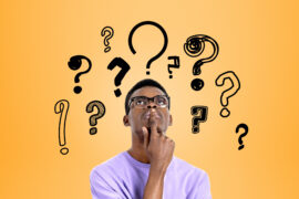 Student looking up with question marks above his head about Verbal Analogies AFOQT