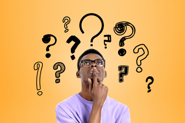 Student looking up with question marks above his head about Verbal Analogies AFOQT