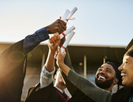 Students graduating their master's programs