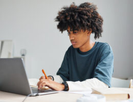 Student practicing with online SAT and PSAT practice tests